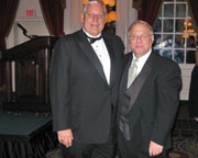 Duce (r) with PGA President Allen Wronowski at the March 3 banquet. Photo courtesy of Andrew Blair, VSGA.